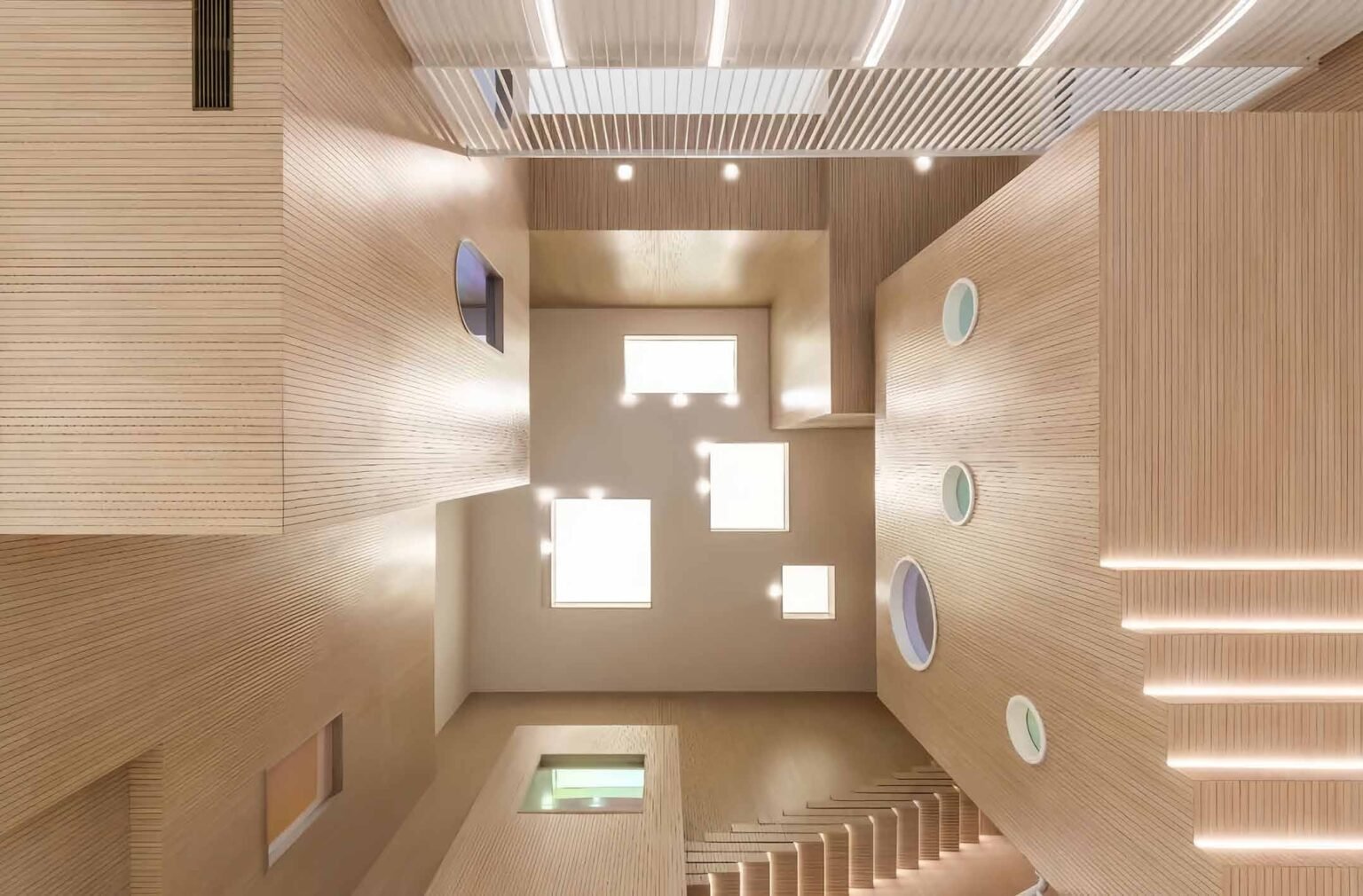 Wood slat acoustic panels in a concert-hall interior
