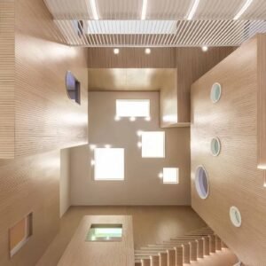 Grooved wood acoustic panels in concert hall auditorium